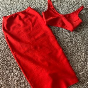 Women’s red two piece skirt and crop top set.